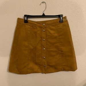 Brown butting down Mimi shirt.